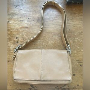 Coach Leather Shoulder Bag with adjustable shoulder strap Tan Color.